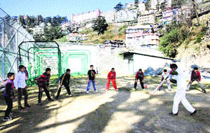 Young players during a practice session at the HPCA cricket academy at Lalpani in Shimla. 