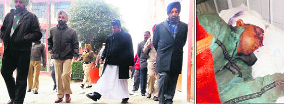 The police investigate the crime scene; and (right) injured watchman Som Lal under treatment at a hospital in Nakodar on Wednesday. 