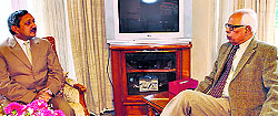 Director General of Youth Services and Sports Naveen Agarwal with Governor NN Vohra at Raj Bhawan in Jammu on Wednesday