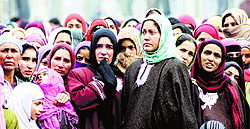 Relatives of slain Hizbul Mujahideen militant Waseem Yousuf Dar mourn at his funeral in the valley on Wednesday