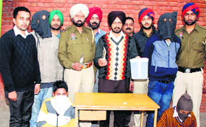 The accused in police custody.