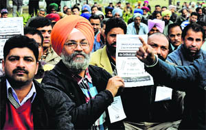 Employees of the PAU participate in an election rally organised by the PAU Employees Democratic Front in Ludhiana on Wednesday. 
