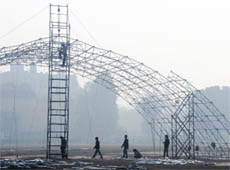 Workers prepare the venue for the National Youth Festival at Punjab Agricultural University in Ludhiana on Wednesday. 