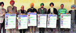 Faculty members of Guru Kashi University, Talwandi Sabo, at the calendar releasing cermony in Bathinda on Thursday