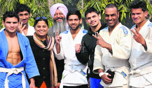 Winners in a jubilant mood at the Gymnasium Hall of Panjab University in Chandigarh on Thursday. 