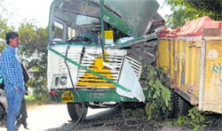 Mangled remains of a Punjab Roadways bus after it hit a tractor-trailer on the Jalandhar-Nakodar highway on Thursday morning. Tribune Photo: Malkiat Singh