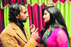 Artistes Neha Lahotra and Himanshu Darshan perform a play at a restaurant in Jammu.