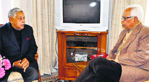 Governor NN Vohra interacts with former MP Janak Raj Gupta on Thursday. 