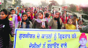 Residents of Verka stage a protest in the township against the Police Department for its failure to solve the Gurkirat murder case that occurred over a year ago.