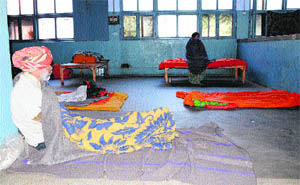 The homeless people at Old Karam Singh Ward which has been converted into a Raen Basera in Amritsar on Friday. 
