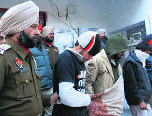 The police arrest a gang of five robbers in Amritsar on Friday. 