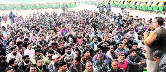 The Tricity LPG Auto-rickshaw Union protests at the Rally Ground in Sector 25, Chandigarh, on Friday. Tribune photo: Manoj Mahajan