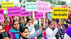Students of Shivnagar college demand its takeover by government at Panchrukhi near Palampur on Friday