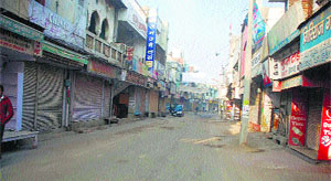 A market in Bhiwani wears a deserted look during a bandh against high power tarrif on Friday. 