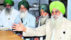 BKU president Ajmer Singh Lakhowal (extreme left) at a press conference in Ludhiana on Friday