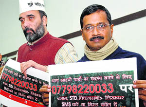 Delhi Chief Minister Arvind Kejriwal along with AAP leader Gopal Rai launches the free membership drive in New Delhi on Friday.
