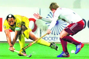 India captain Sardar Singh in action against England on Friday.