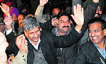 Chief Parliamentary Secretary Sarup Chand Singla dances while celebrating Lohri Dheeyan Di at Jaipalgarh village in Bathinda on Saturday