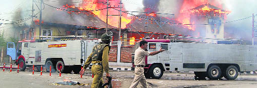Protesters burn the Chief Engineer’s office after a rally against the alleged killings of civilians by security forces.