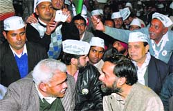 Yogendra Yadav (right), national executive member of the AAP, talks to retired IPS officer VN Rai during a district-level convention in Karnal on Saturday. Tribune photo: Ravi Kumar