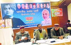 Former CM PK Dhumal, state BJP president Satpal Satti and state in charge Balbir Punj at a press conference in Baddi on Saturday.