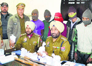 A gang of robbers in police custody in Jalandhar on Saturday. 