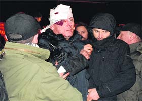 Former Ukrainian interior minister and opposition leader Yuriy Lutsenko being taken to hospital in Kiev