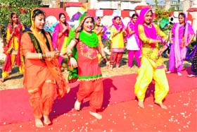 Revelry: Students of Sri Guru Harkrishan Senior Secondary Public School present an item during the Lohri celebrations on campus in Amritsar