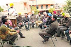 Members of the Sikhya Providers Union during a meeting held at Teachers Home in Bathinda on Sunday. Tribune photo: Pawan Sharma