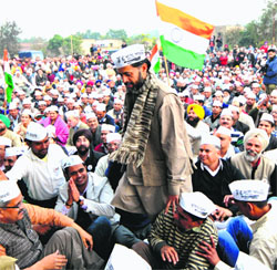 Yogendra Yadav and a supporter of the party.