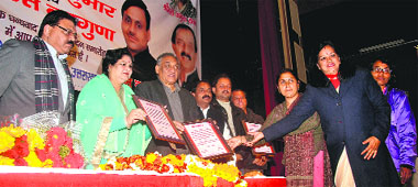 Chief Minister Vijay Bahuguna being felicitated by anganwari workers and the Mini Karamchari Sangthan at a function in Dehradun on Sunday. 