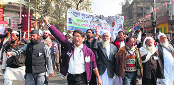 An anti-government protest in Kolkata on Friday. West Bengals troubles can be traced to the Communist government which swelled by recruiting Marxist workers to satisfy its voracious hunger to control the entire State machinery. Its administrative expenditure shot up, landing the state in heavy debt