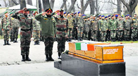 Chinar Corps Commander Lt General Gurmit Singh and others pay tributes to the mortal remains of Naik Lempa Konyak of 5 Assam Regiment in Srinagar on Sunday.