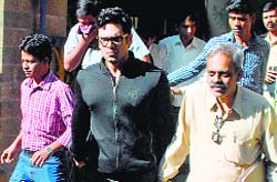 Anant Vardhan, president, Corporate Affairs of the Yash Birla Group, arrives in Killa court in Mumbai on Sunday. PTI 