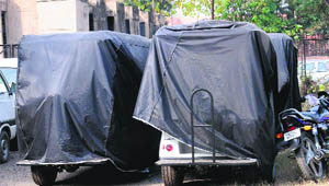 Battery-operated golf carts parked at the PGI in Chandigarh.