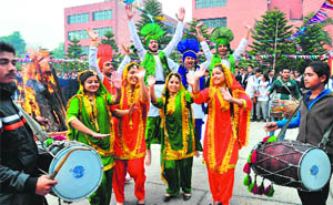 Students dance during the Lohri celebrations at the Dr BR Ambedkar Institute of Hotel Management, Catering and Nutrition in Sector 42, Chandigarh, on Monday.