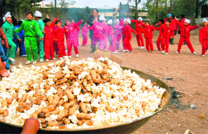 Students and staff members of Lawrence Public School, Mohali, dance during Lohri celebrations on Monday.