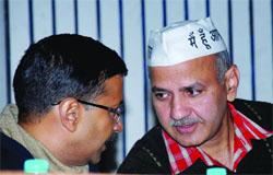 Chief Minister Arvind Kejriwal with Education Minister Manish Sisodia in a press conference to launch the helpline at Delhi Secretariat in New Delhi on Monday.