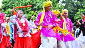 Students from Haryana present a cultural item during the closing ceremony of the state-level scouts and guides rally at MKP PG College in Dehradun on Sunday.