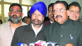 The Leader of the Opposition, Ajay Bhatt, addresses mediapersons in the Assembly building in Dehradun on Monday.