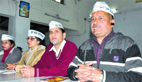 Aaam Aadmi Party's state spokesperson Ranveer Chaudhri addresses a press conference at Hindi Bhavan in Dehradun on Monday.