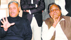 Rao Inderjit Singh (left) addresses mediapersons in Bhiwani on Monday.