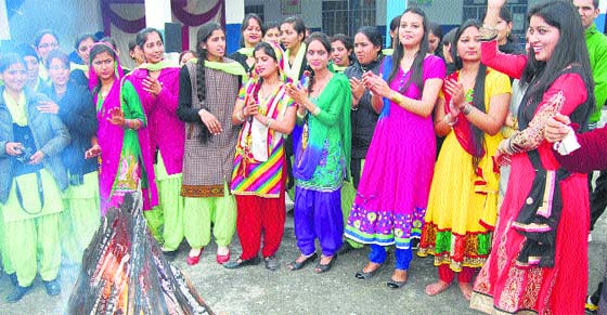 BEd students celebrate Lohri in Mandi on Monday. Photo: Jai Kumar