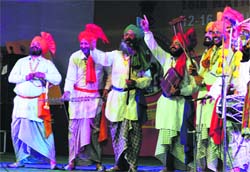 Veterans perform Malwai Giddha to celebrate Lohri during the 18th National Youth Festival at the PAU in Ludhiana on Monday. Tribune Photo: Himanshu Mahajan