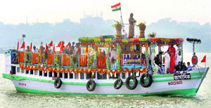 A tableau on a boat on the Ganga marks the closing ceremony of Swami Vivekanandas 150th birth anniversary celebrations in Kolkata on Monday.
