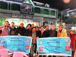 Members of the Rotary International celebrate three years of the polio free India campaign in Mussoorie on Monday. 