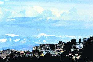 Clouds over snow-covered mountains seen from Shimla on Tuesday