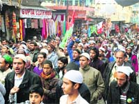 Devotees take out a procession in Reasi on the occasion of Eid Milad-un-Nabi on Tuesday. A Tribune photograph