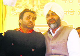 PPP president Manpreet Badal and Bhagwant Mann in Muktsar on Tuesday.