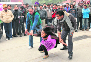 Artistes stage a play, 'Gunday', at the Sector 17 Plaza on Wednesday.